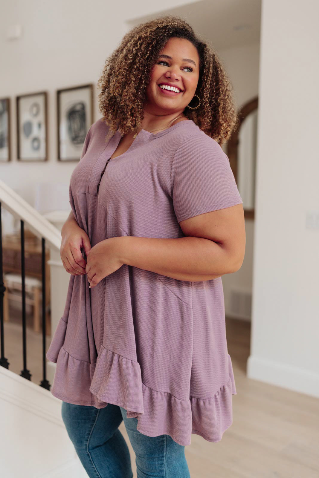 Lavender Sweet Breeze Tunic Dress featuring a button-up v neckline and ruffled hem, made from soft waffle knit fabric.