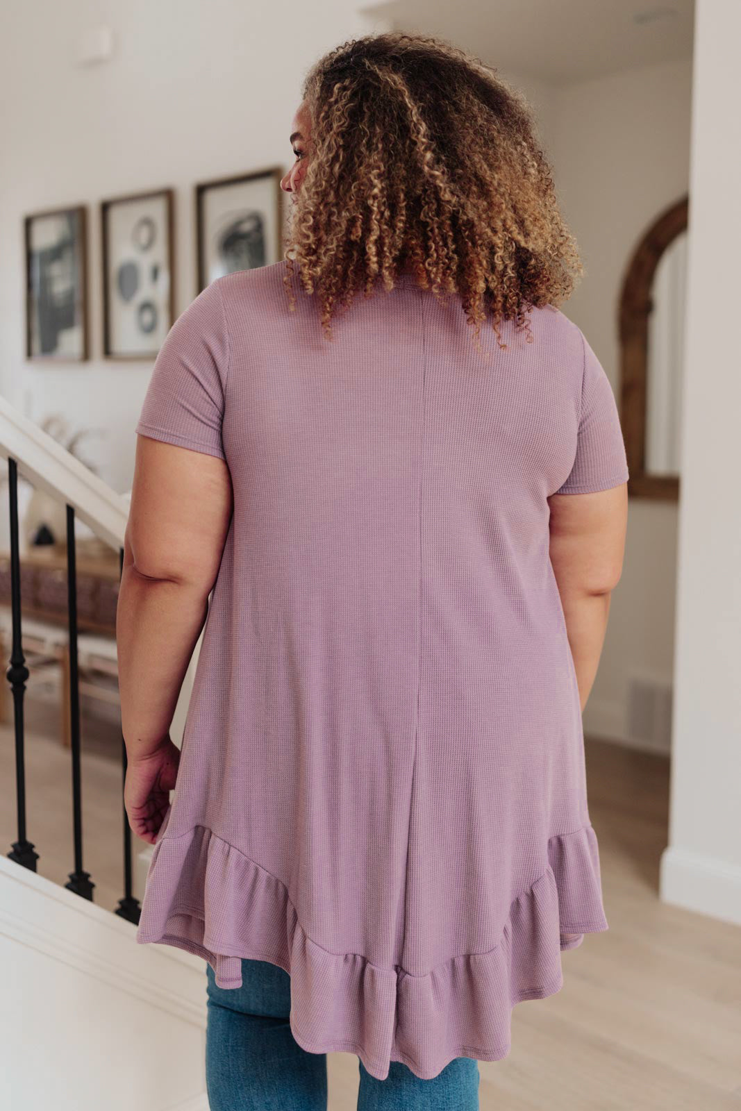 Lavender Sweet Breeze Tunic Dress featuring a button-up v neckline and ruffled hem, made from soft waffle knit fabric.