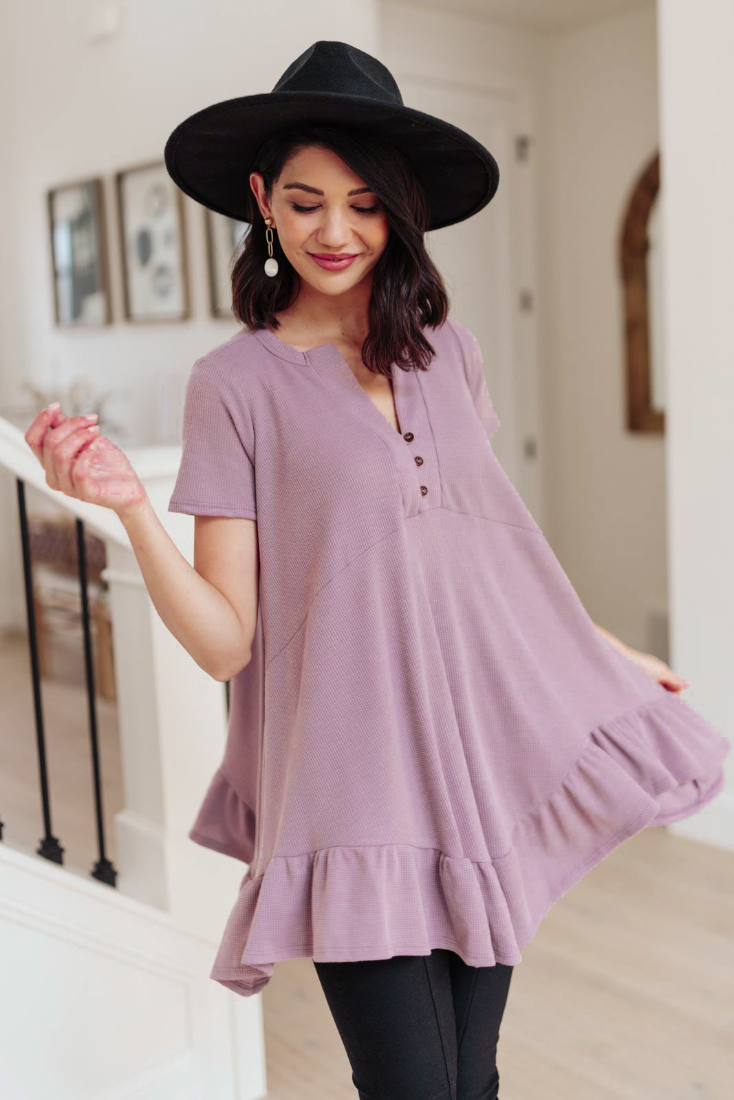 Lavender Sweet Breeze Tunic Dress featuring a button-up v neckline and ruffled hem, made from soft waffle knit fabric.