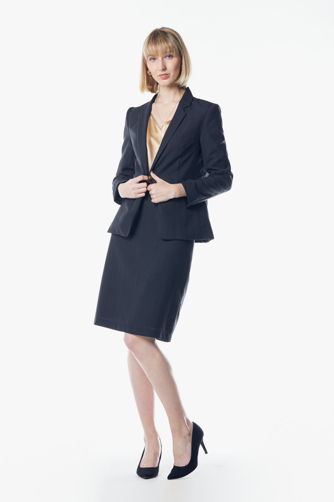 A luxurious dark grey wool blazer designed for formal workwear, featuring a structured silhouette and classic design.