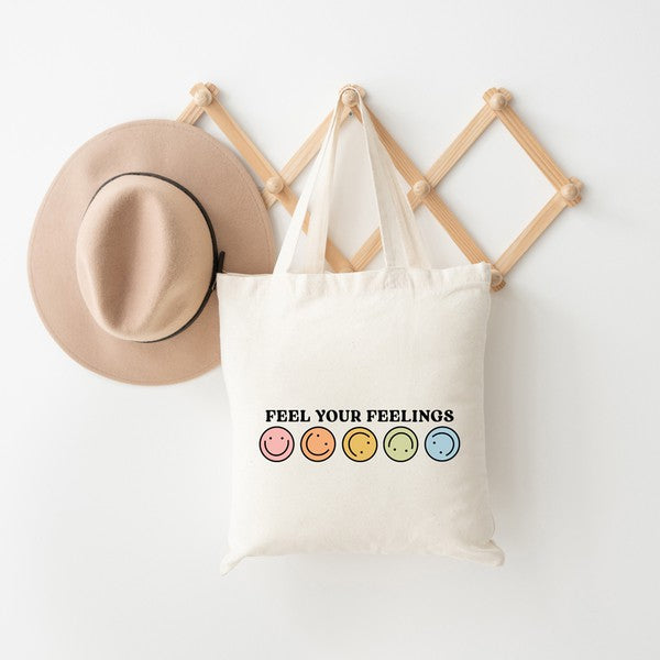 Colorful canvas tote bag with positive messages, perfect for daily use.