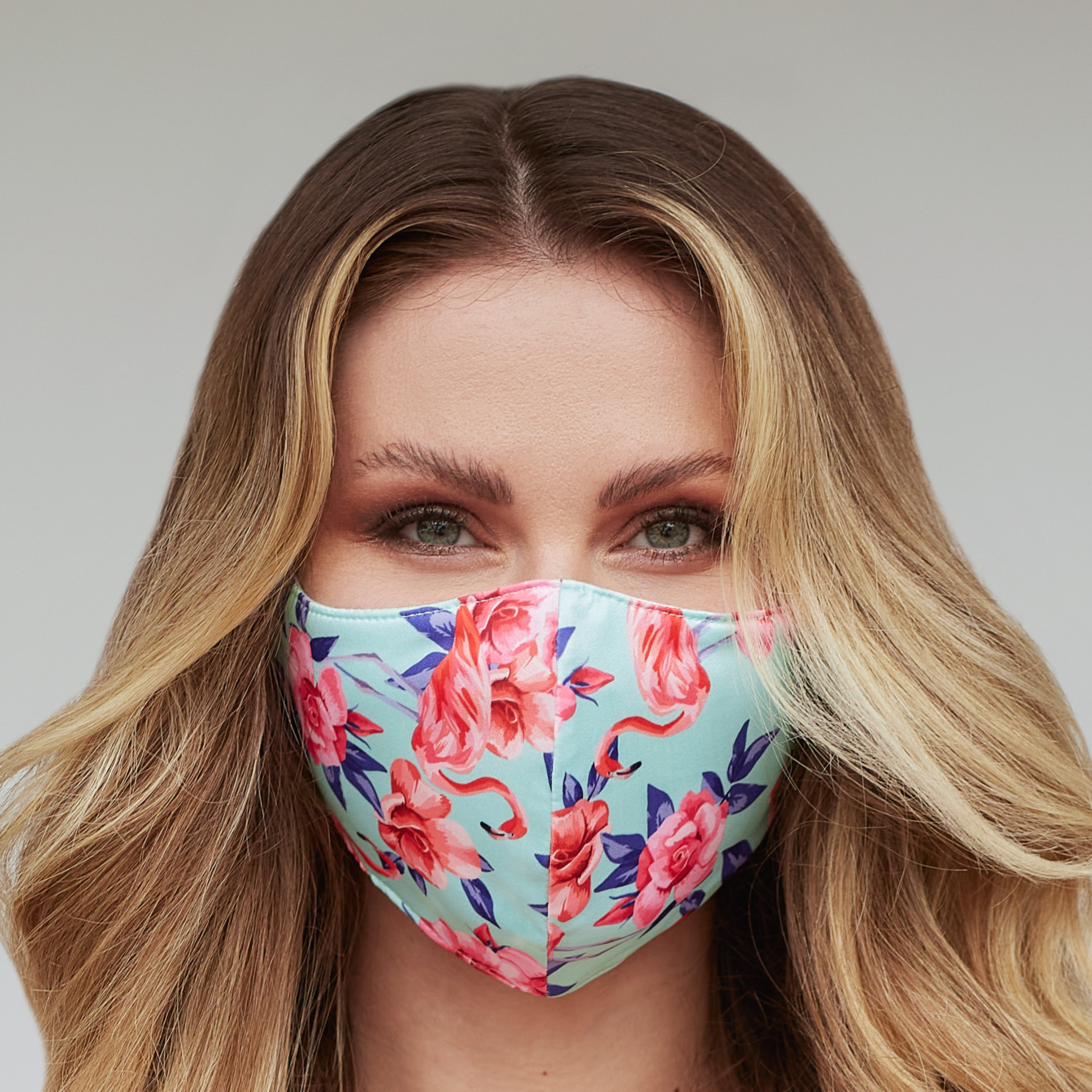 Teal Flamingo Face Mask featuring a vibrant flamingo design, perfect for stylish protection.