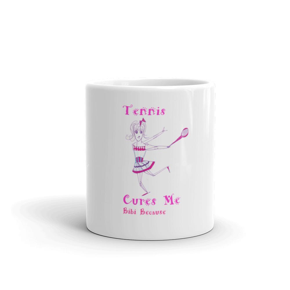 A glossy white ceramic mug from the Tennis Cures Me collection featuring a vivid print, perfect for coffee or tea.