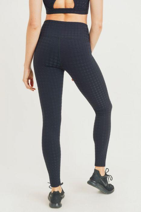 Textured Houndstooth Jacquard TACTEL® Highwaist Leggings showcasing unique pattern and highwaist design for comfort and style.