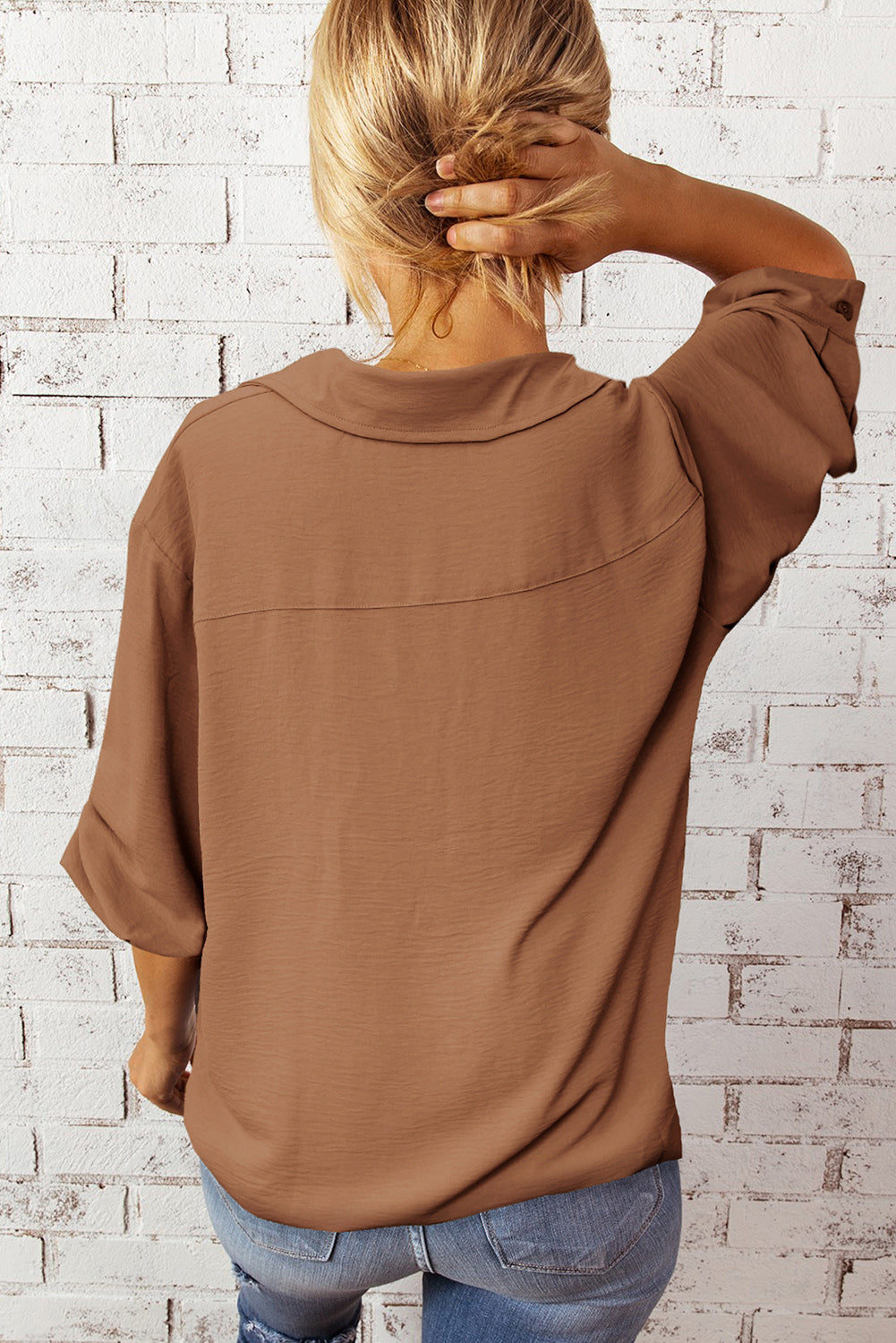 Textured Johnny Collar Three-Quarter Sleeve Blouse in a studio setting, showcasing its stylish design and textured fabric.