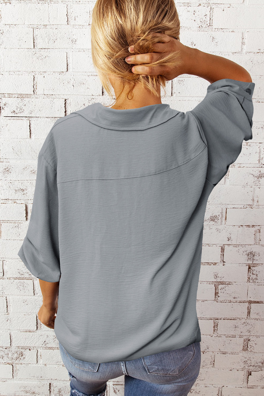 Textured Johnny Collar Three-Quarter Sleeve Blouse in a studio setting, showcasing its stylish design and textured fabric.