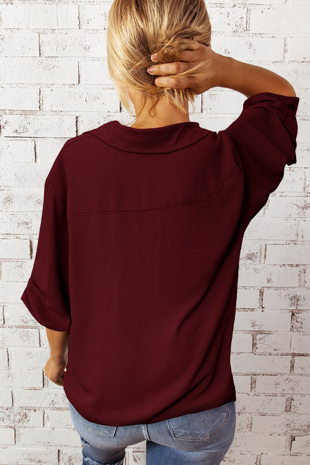 Textured Johnny Collar Three-Quarter Sleeve Blouse in a studio setting, showcasing its stylish design and textured fabric.