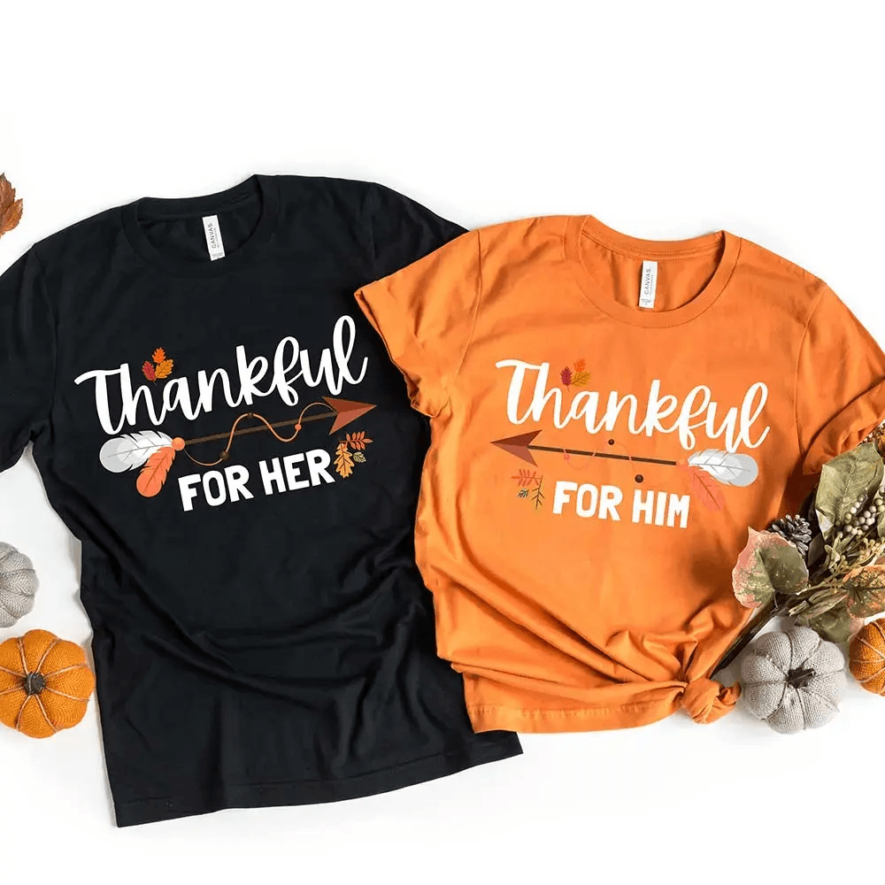 Thankful For Her/Him Thanksgiving Couple T-Shirt featuring a comfortable fit and festive design, perfect for couples celebrating Thanksgiving.