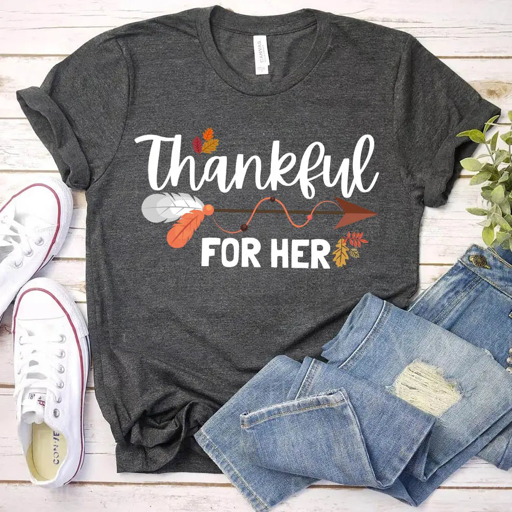 Thankful For Her/Him Thanksgiving Couple T-Shirt featuring a comfortable fit and festive design, perfect for couples celebrating Thanksgiving.