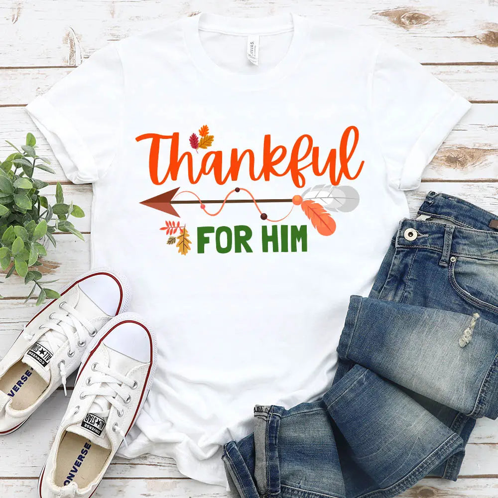 Thankful For Her/Him Thanksgiving Couple T-Shirt featuring a comfortable fit and festive design, perfect for couples celebrating Thanksgiving.