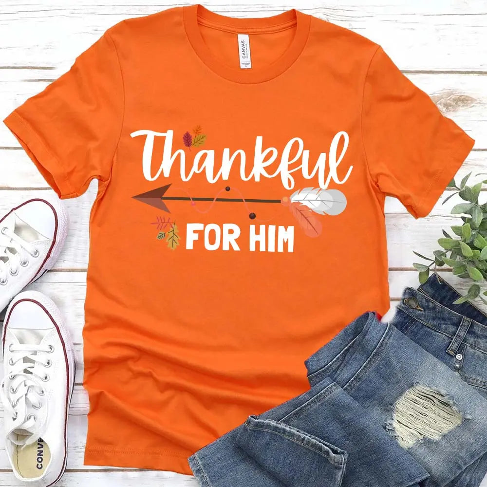 Thankful For Her/Him Thanksgiving Couple T-Shirt featuring a comfortable fit and festive design, perfect for couples celebrating Thanksgiving.