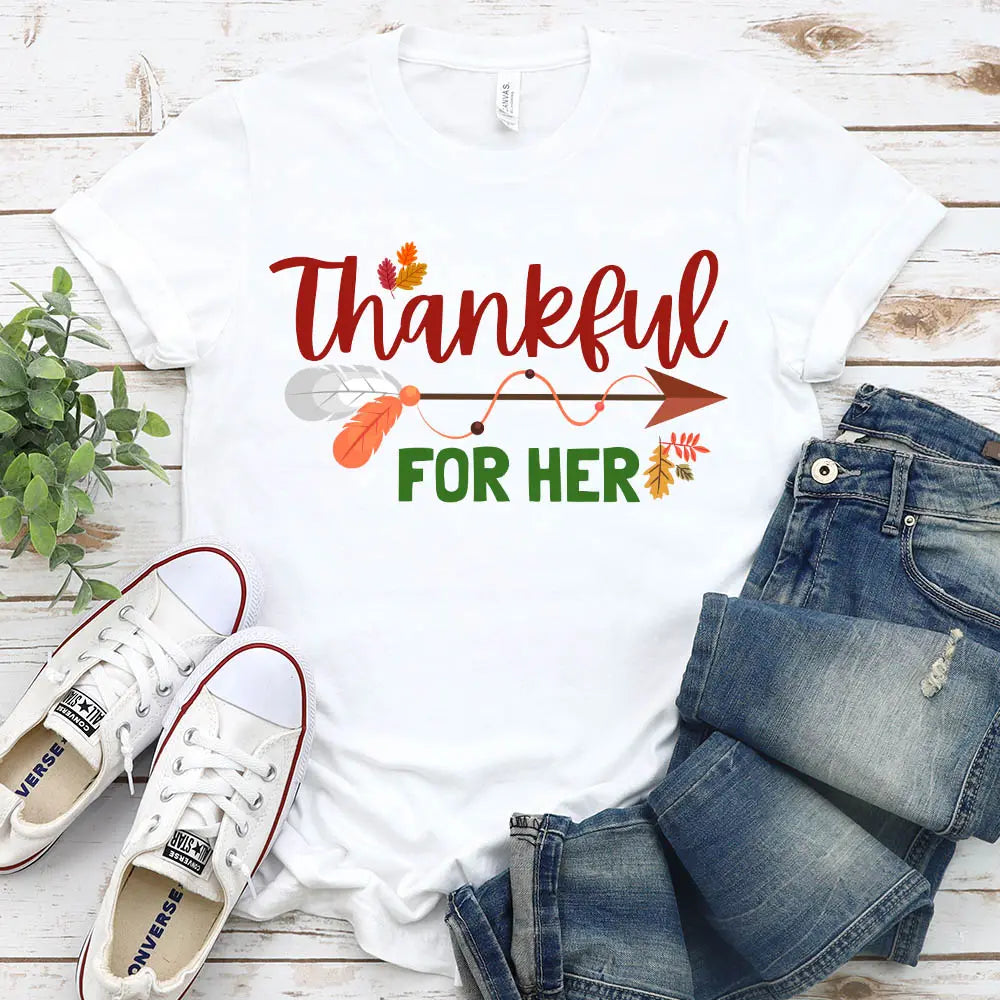 Thankful For Her/Him Thanksgiving Couple T-Shirt featuring a comfortable fit and festive design, perfect for couples celebrating Thanksgiving.