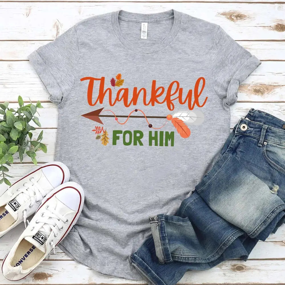 Thankful For Her/Him Thanksgiving Couple T-Shirt featuring a comfortable fit and festive design, perfect for couples celebrating Thanksgiving.