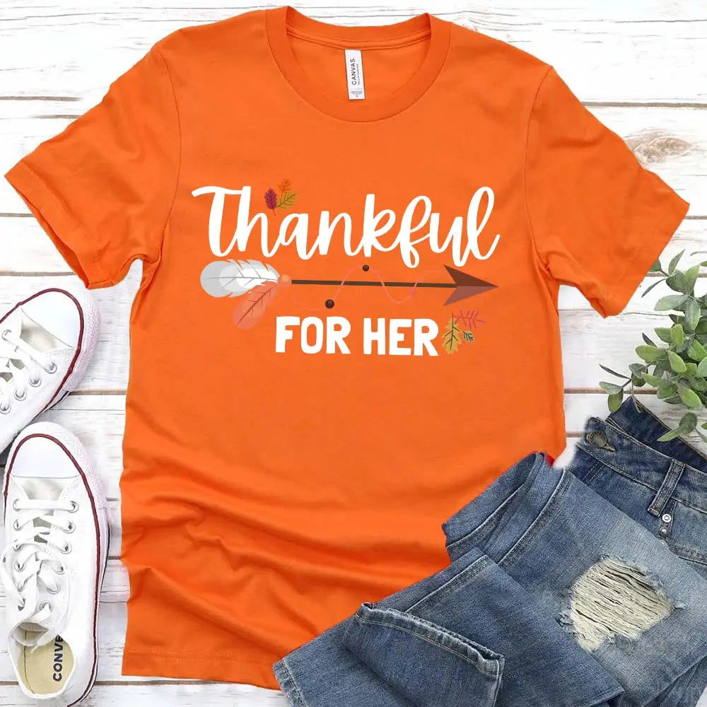 Thankful For Her/Him Thanksgiving Couple T-Shirt featuring a comfortable fit and festive design, perfect for couples celebrating Thanksgiving.