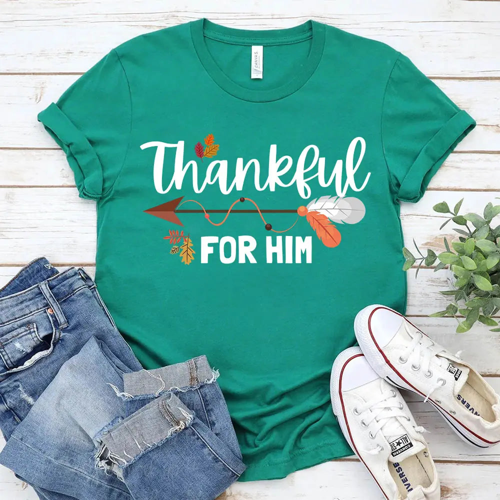 Thankful For Her/Him Thanksgiving Couple T-Shirt featuring a comfortable fit and festive design, perfect for couples celebrating Thanksgiving.