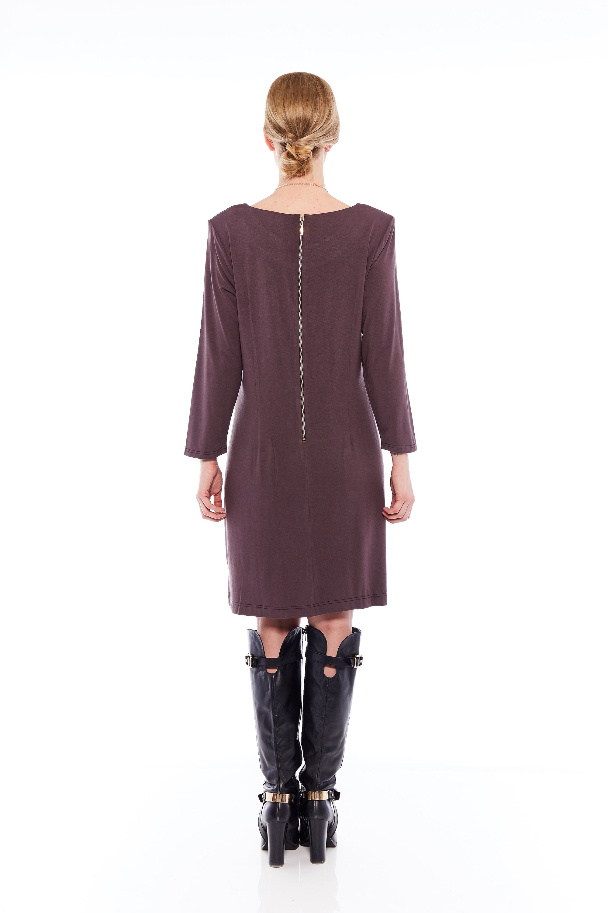 A stylish loose-fit shift dress in nut brown, featuring full sleeves and a flattering pocket, perfect for spring outings.