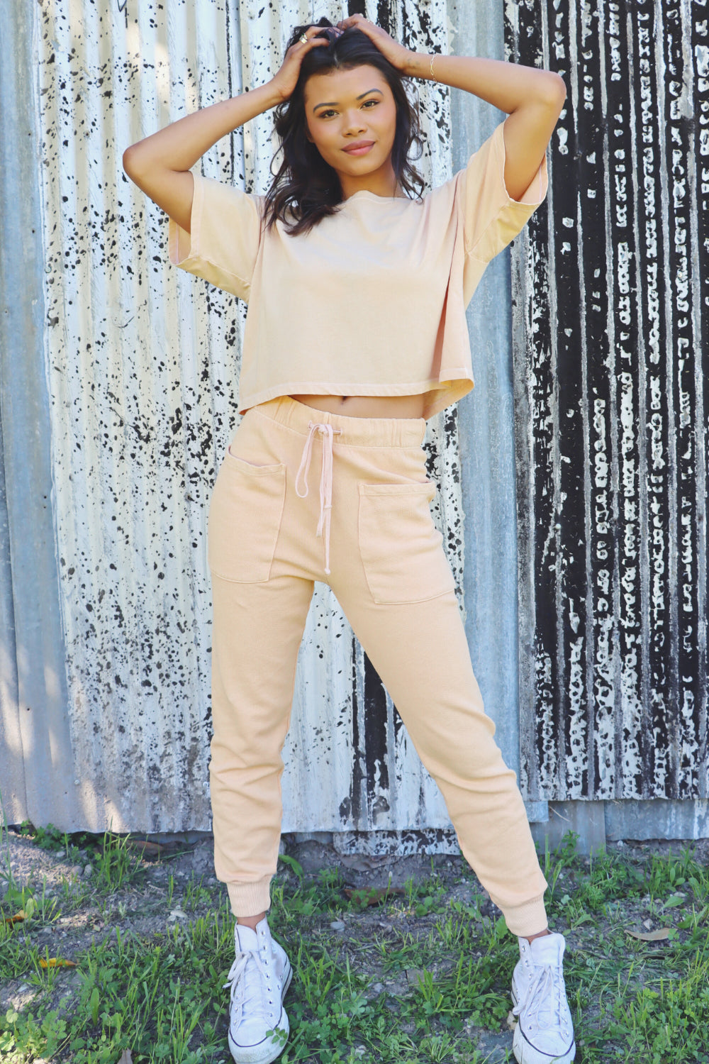 A lightweight boxy cropped t-shirt in Sky Blue and Apricot, showcasing its relaxed fit and eco-friendly fabric.