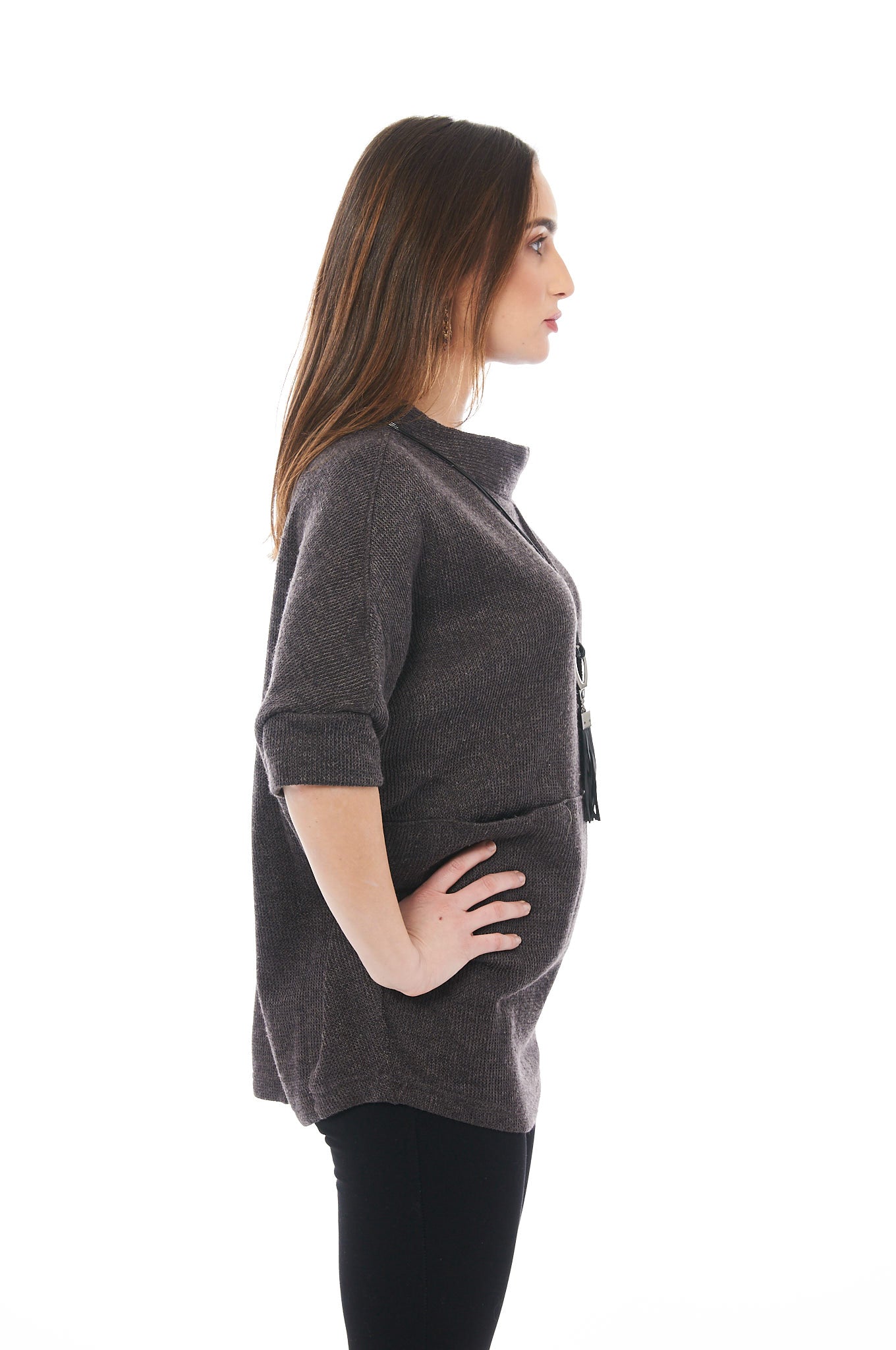 A stylish dark brown baggy knitted top with 3/4 sleeves, showcasing a soft fabric blend perfect for spring.