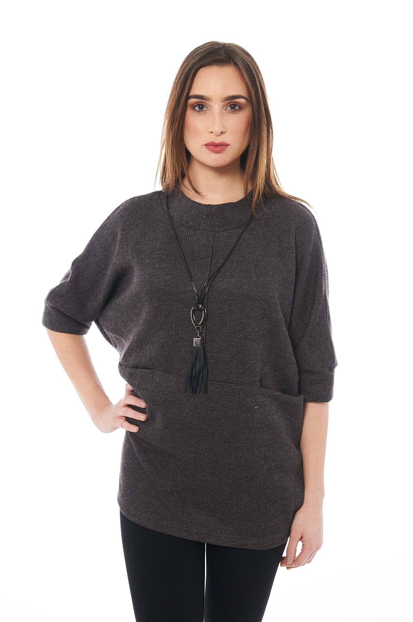 A stylish dark brown baggy knitted top with 3/4 sleeves, showcasing a soft fabric blend perfect for spring.