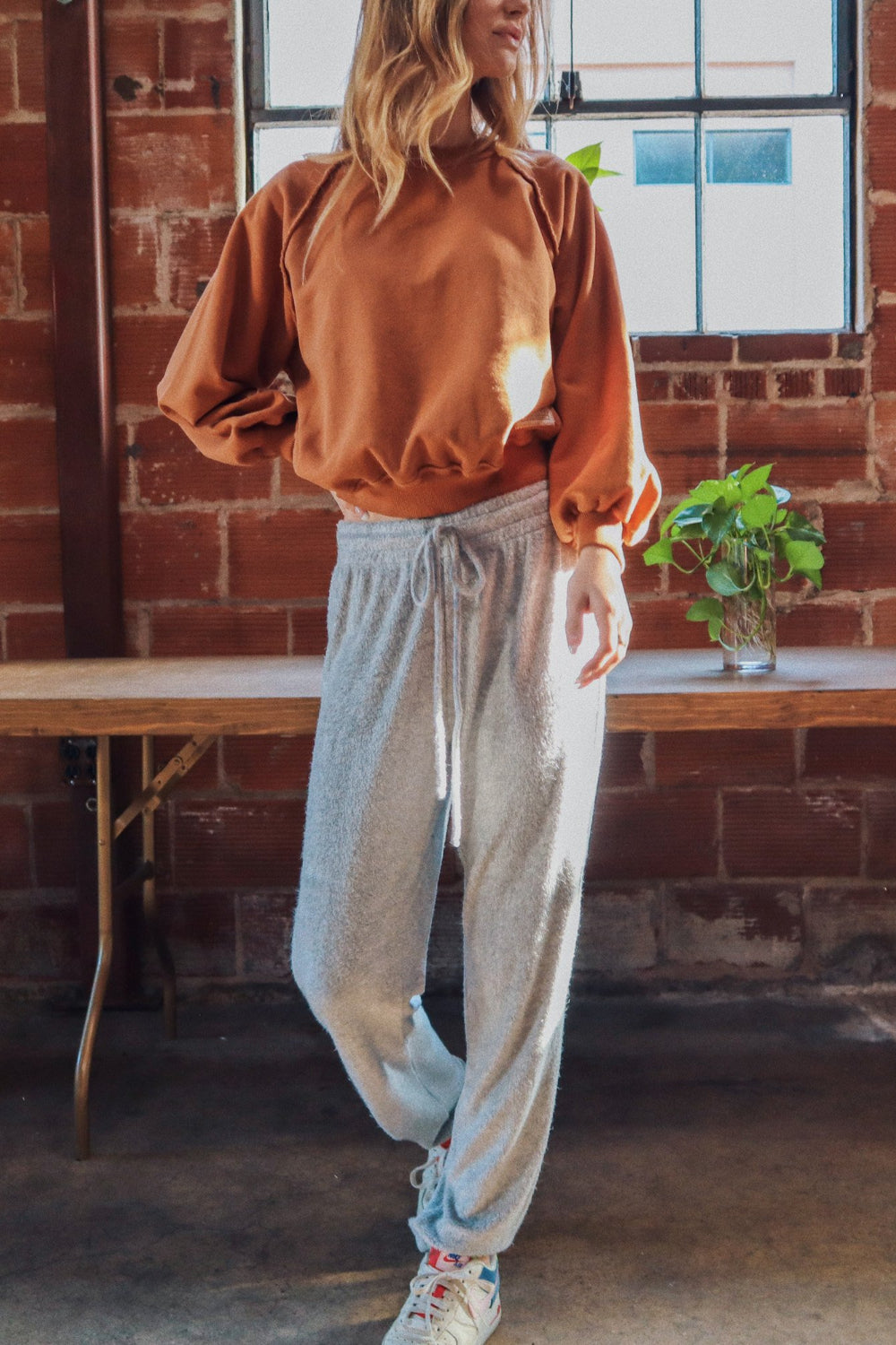 A pair of stylish Heather Gray Bamboo Joggers with a relaxed fit and drawstring waistband, showcasing their soft texture and eco-friendly material.