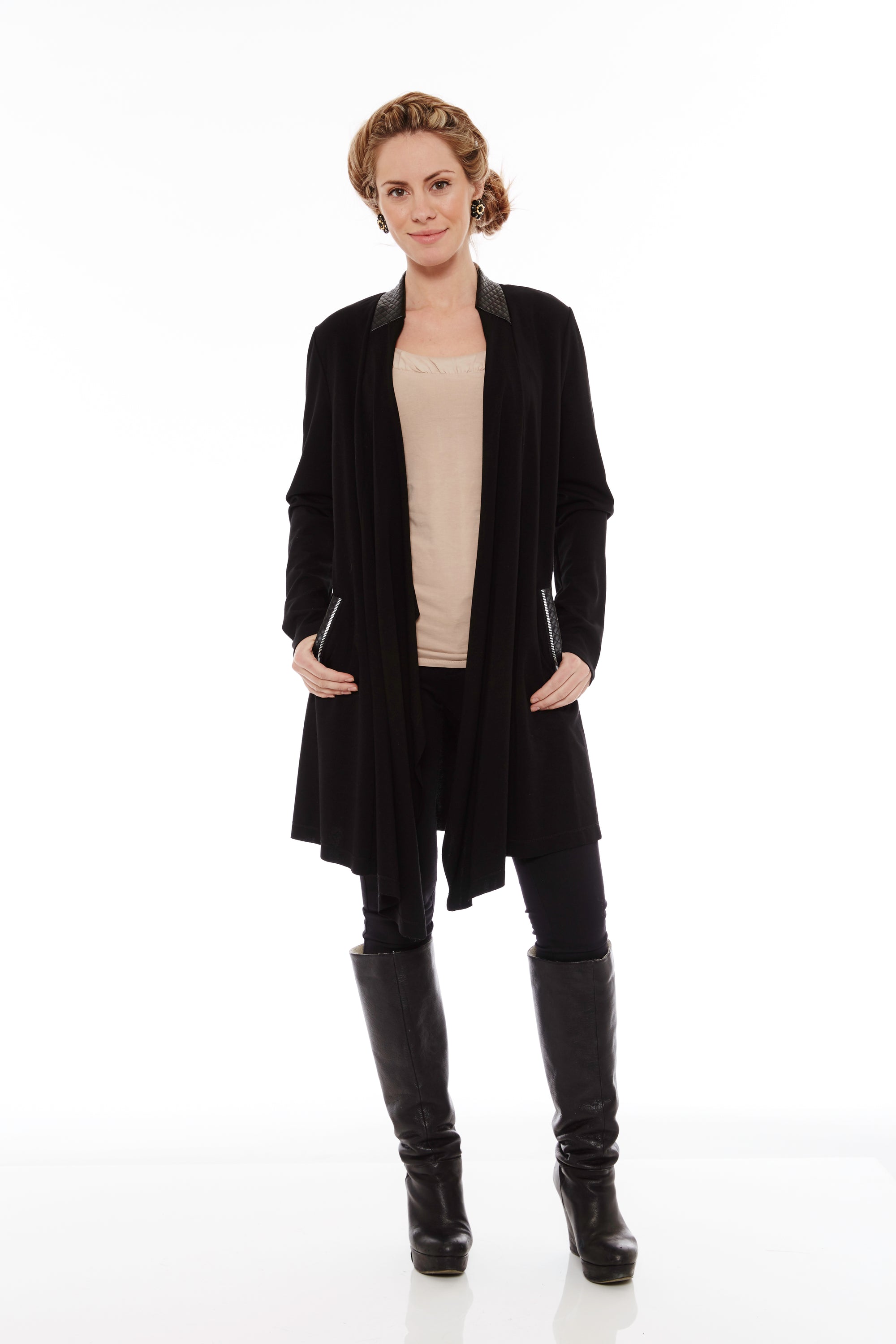 A stylish black pocket cardigan with an open front, featuring large front pockets and a loose fit, perfect for layering and cozy wear.