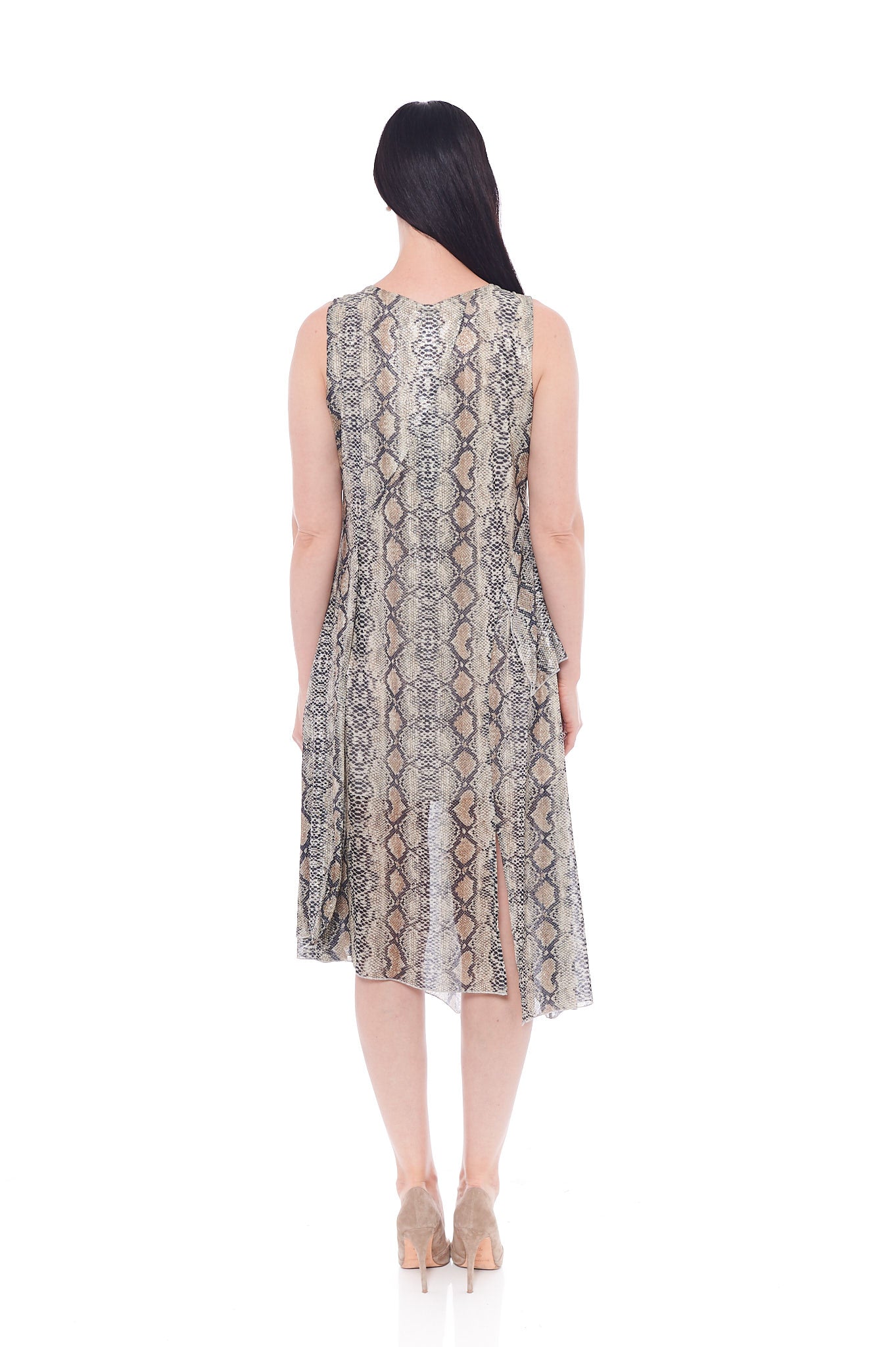 The Brown Snake Dress featuring a cozy oversized fit, chunky print, and sleeveless design, perfect for casual outings.