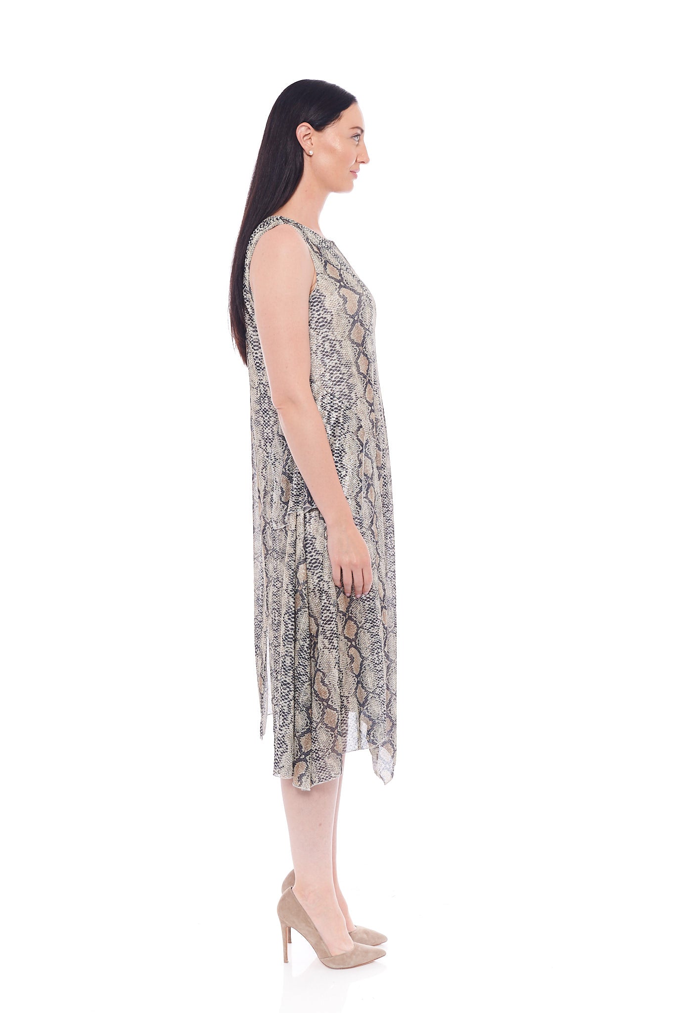 The Brown Snake Dress featuring a cozy oversized fit, chunky print, and sleeveless design, perfect for casual outings.