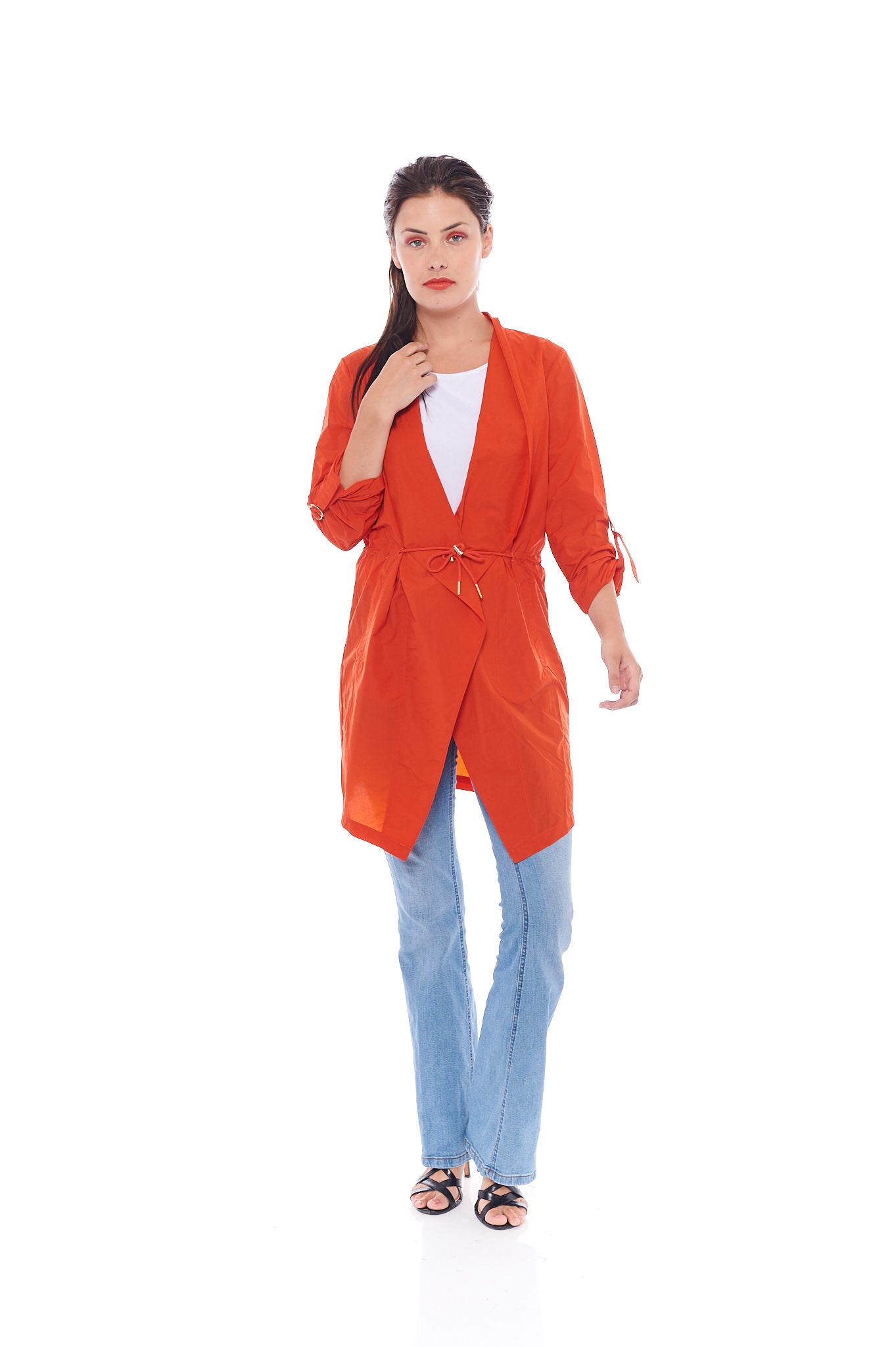 The Coral Turndown Jacket in Tangy Orange featuring stylish long sleeves and button details, perfect for summer wear.