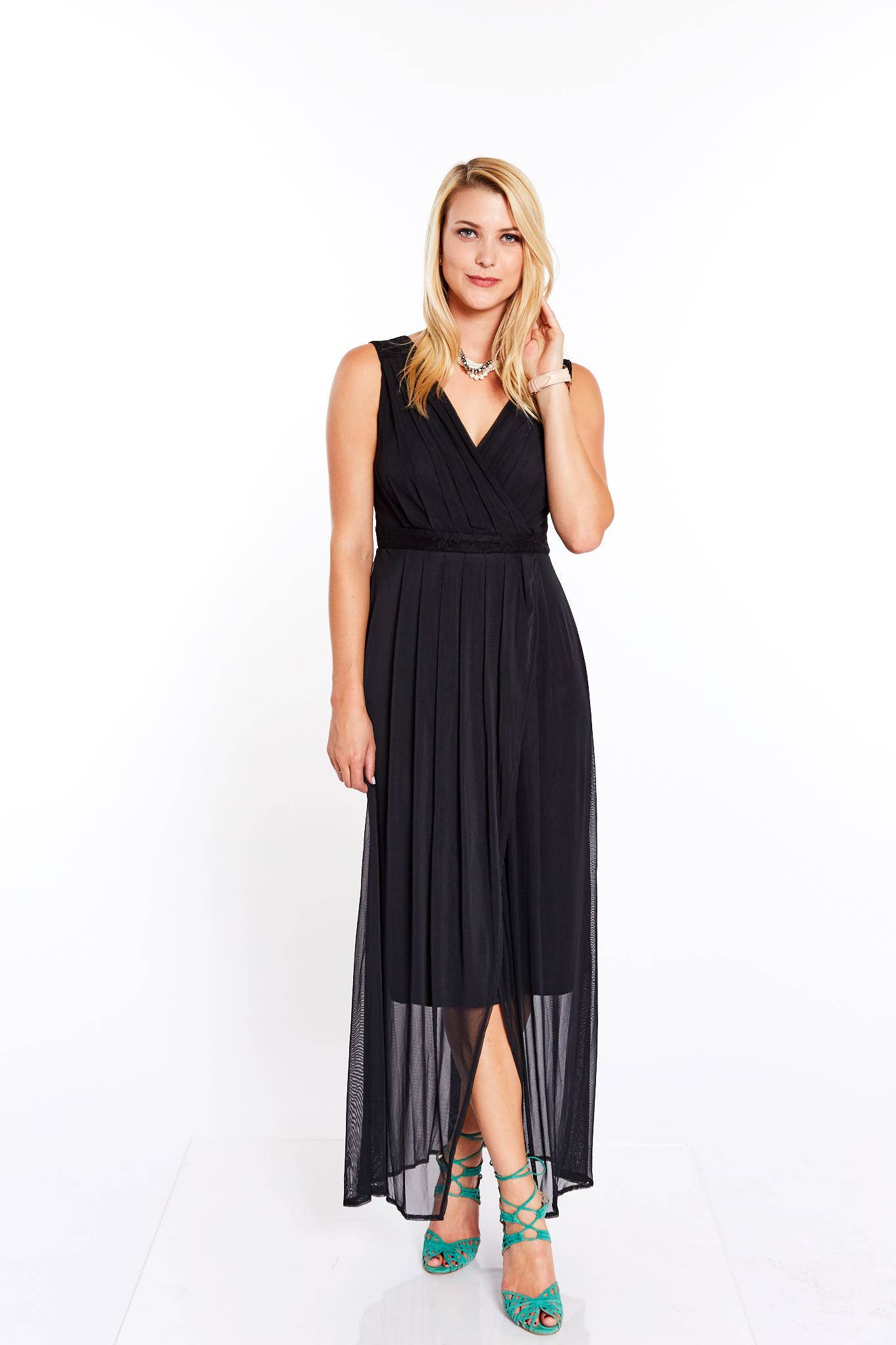 A stylish Deep Black Pleated Maxi Dress featuring a flattering v-neckline and a lightweight, flowing design suitable for various occasions.