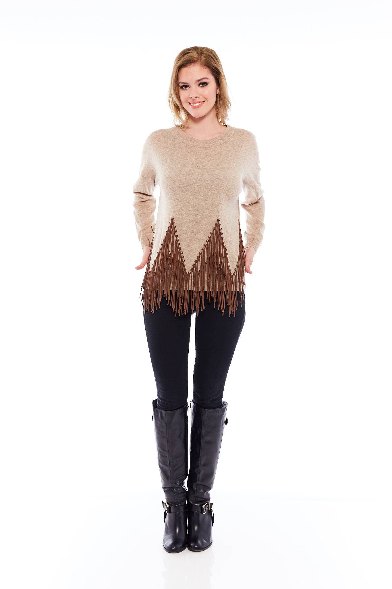 The Elevate Happy Hour Sweater in Classic Beige featuring long sleeves and leather tassels, perfect for stylish comfort.