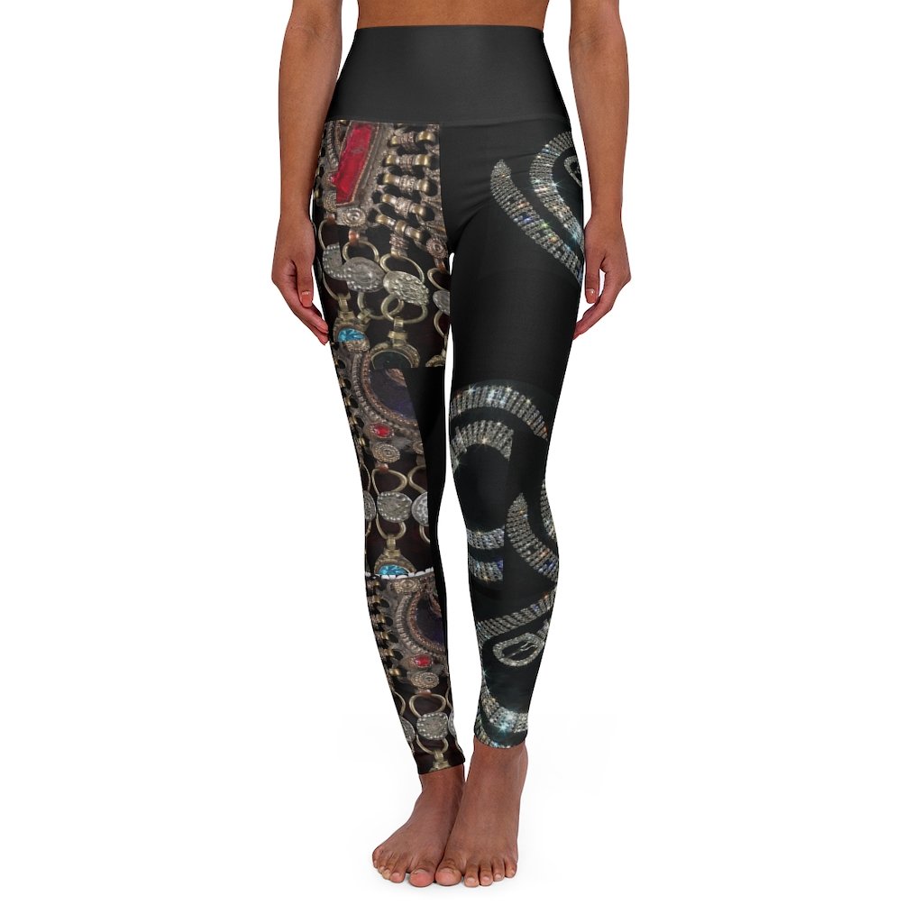 High-waisted skinny fit yoga leggings in black with double layer waistband and color-matched seams.