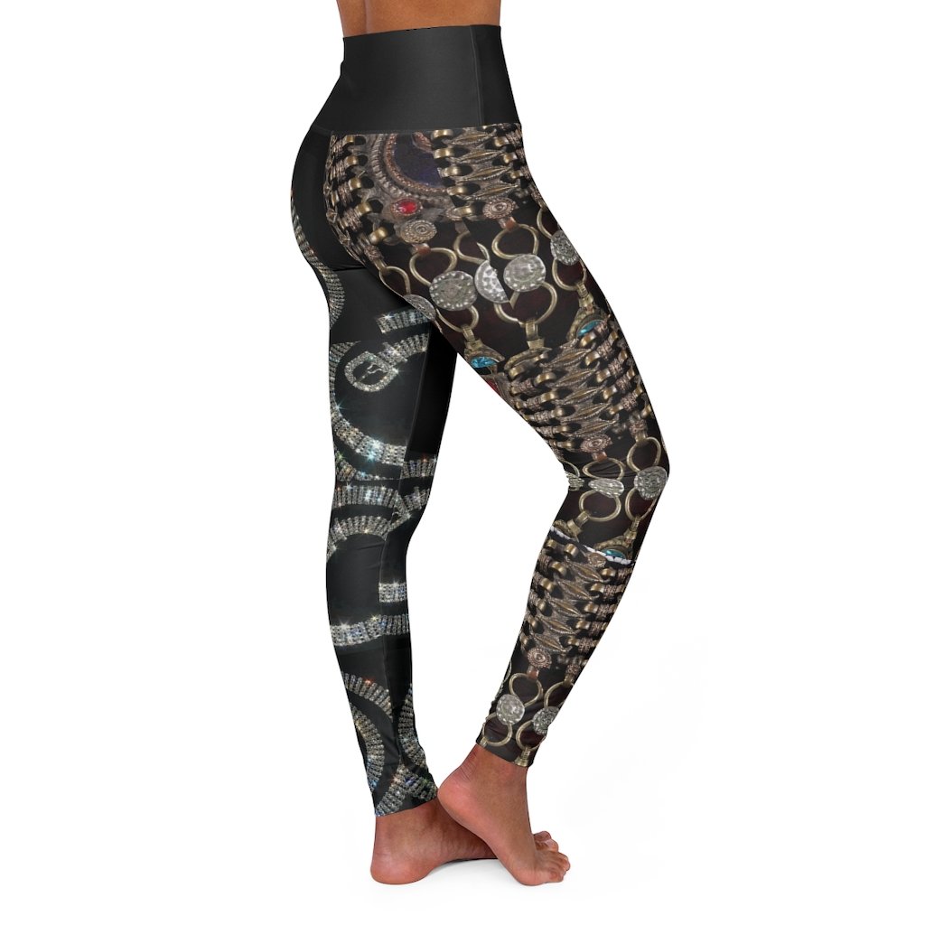 High-waisted skinny fit yoga leggings in black with double layer waistband and color-matched seams.