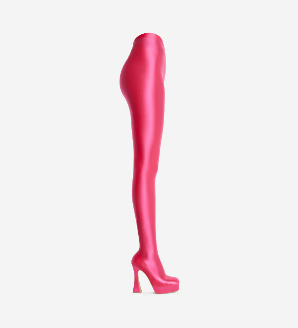 The Giselle Boot in pink lycra with a platform sole and flared block heel, showcasing its stylish long legging design.