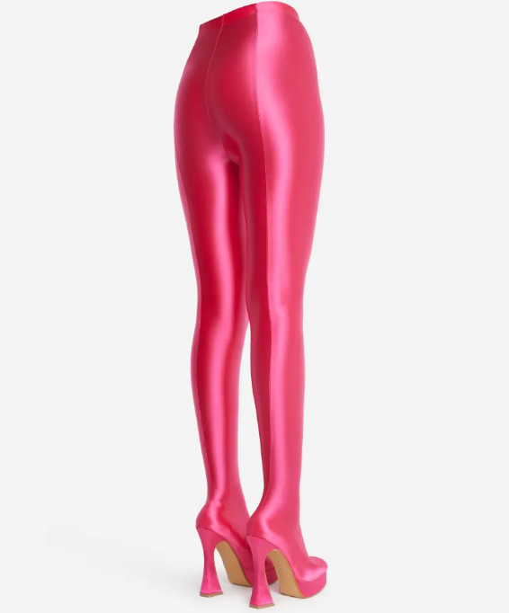 The Giselle Boot in pink lycra with a platform sole and flared block heel, showcasing its stylish long legging design.