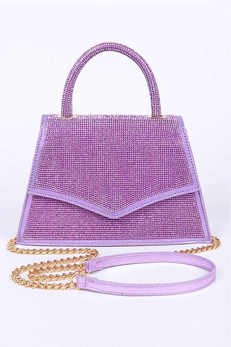 The Kya Purple Bag featuring a vibrant purple color, rhinestone accents, and a compact design, perfect for stylish outings.