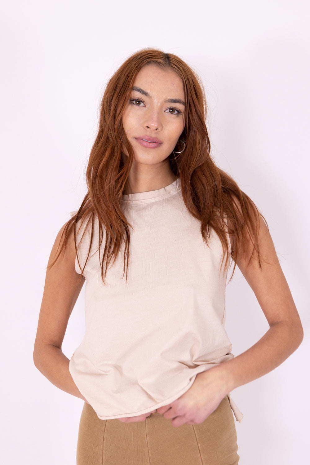 The Margo Tank, a vintage-inspired organic cotton tank top with exaggerated seams and distressed hems, showcasing a relaxed fit.