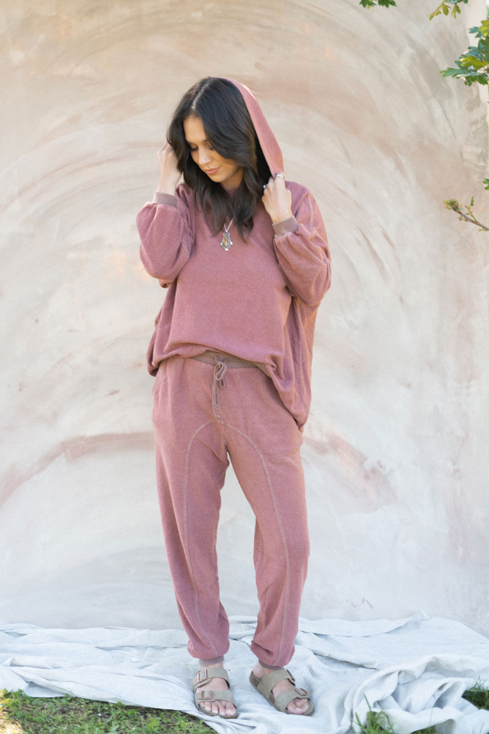 The New 90’s Set oversized hoodie in Rose, Ivory, and Vintage Black, showcasing its relaxed fit and stylish design.