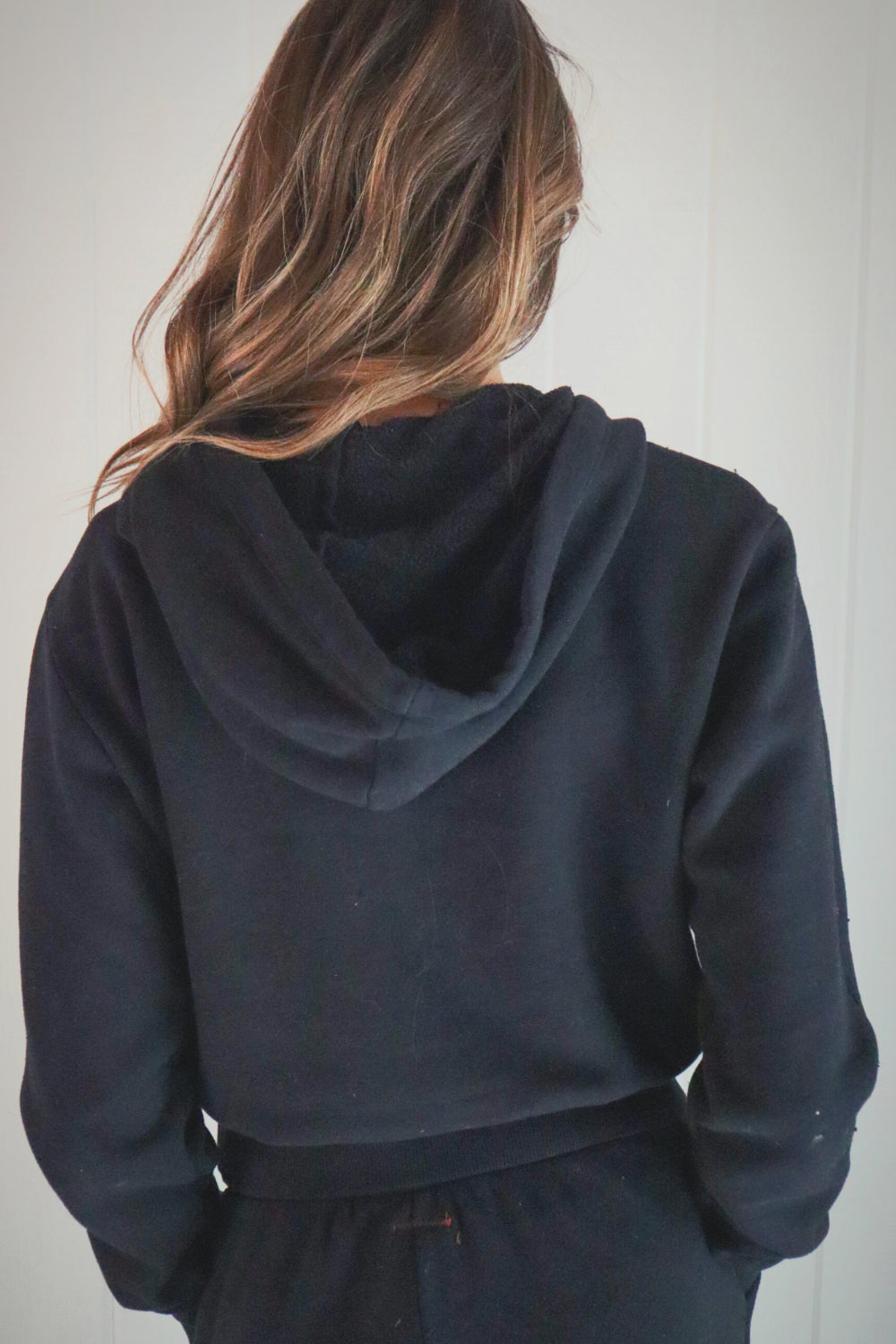 The New Daybreak Hoodie in black, showcasing its relaxed fit and vintage-inspired design, perfect for casual wear.