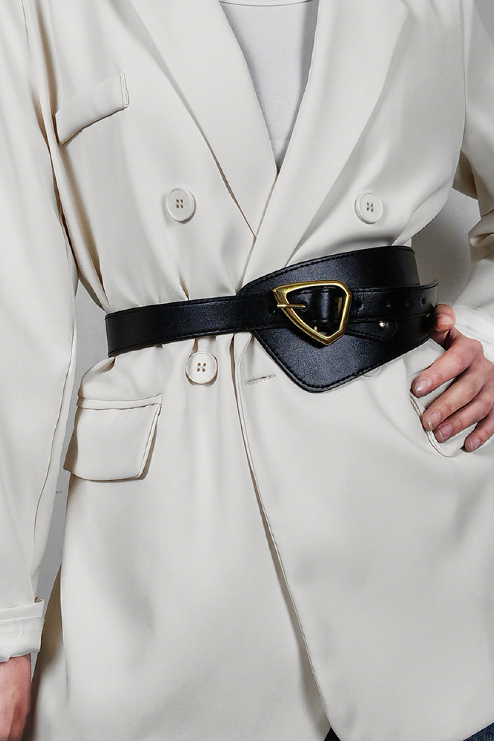 The Olivet PU Leather Belt showcasing its sleek design and durable buckle, perfect for any outfit.