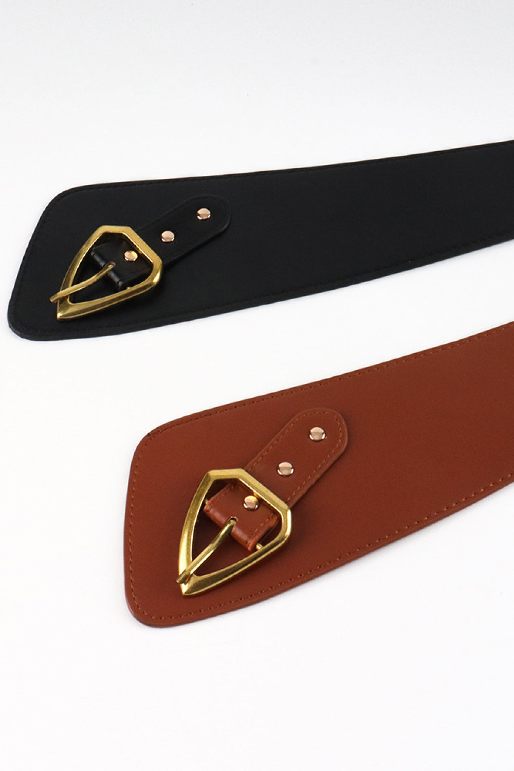 The Olivet PU Leather Belt showcasing its sleek design and durable buckle, perfect for any outfit.