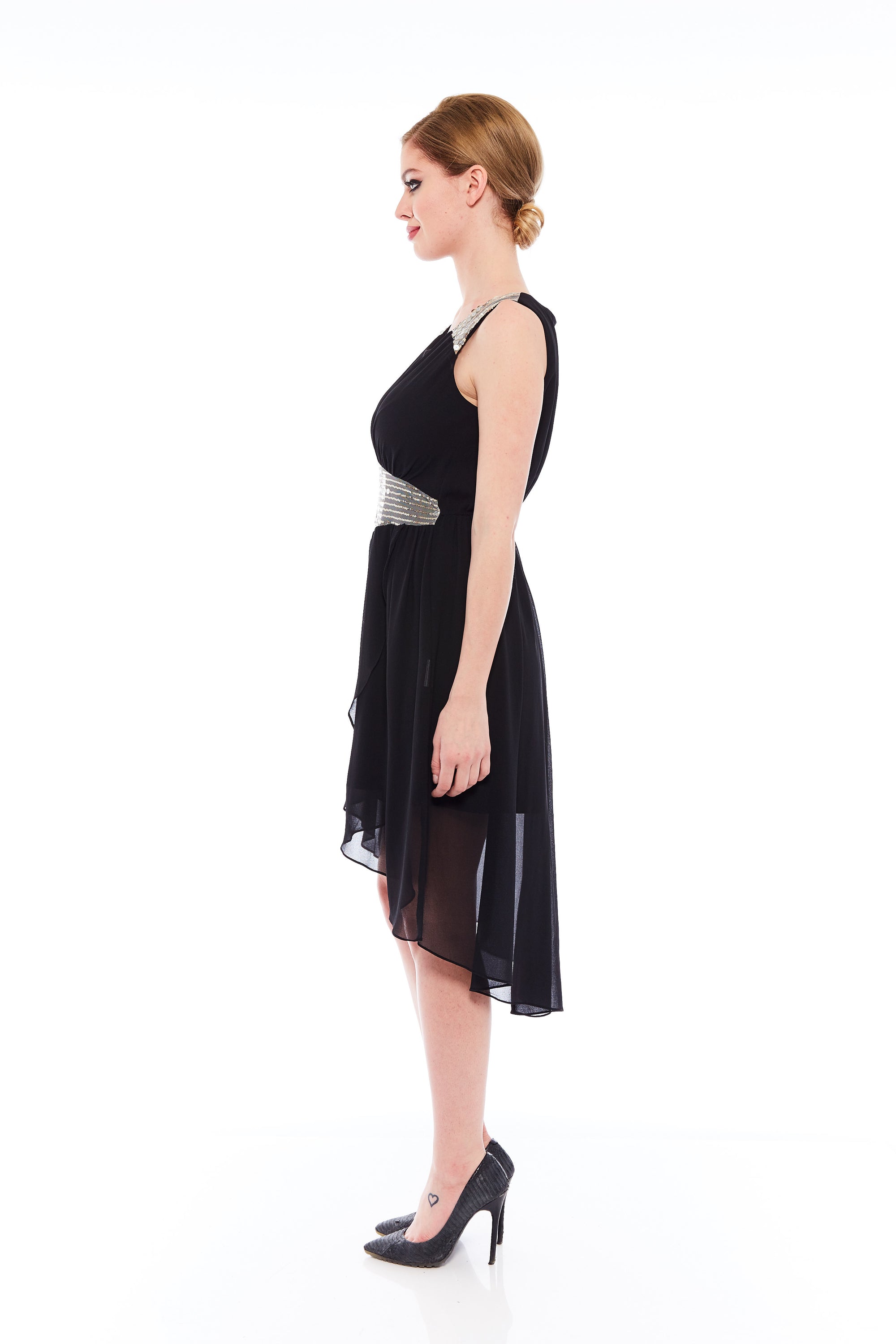 The Patchy Smash Cocktail Dress in Black featuring elegant black sequin patchwork and a stylish round neck design.