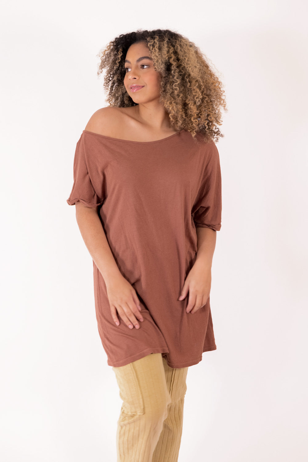 The Rocker Tee in an oversized slouchy silhouette, made from organic cotton and hemp, available in brown, black, and saddle colors.