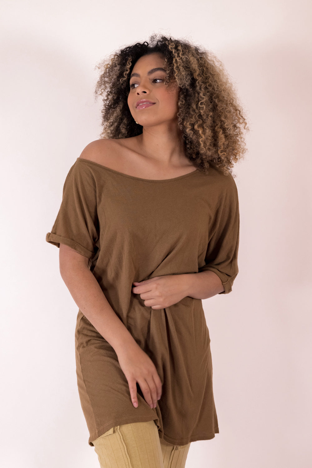 The Rocker Tee in an oversized slouchy silhouette, made from organic cotton and hemp, available in brown, black, and saddle colors.