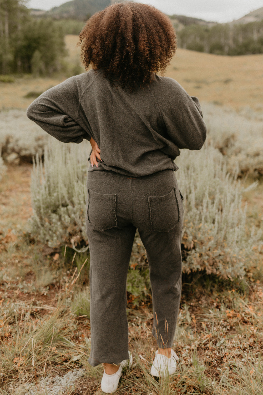 The Smile Sweatshirt in an oversized fit, featuring a feminine neckline and ribbed hems, made from 100% organic cotton.