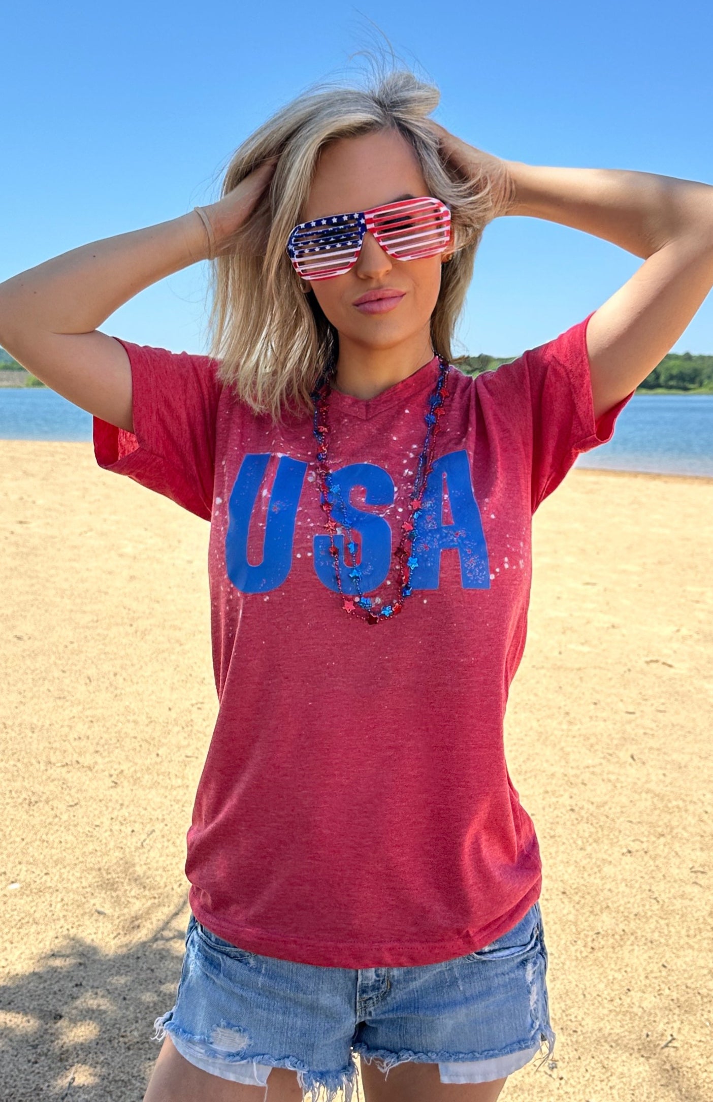 A soft USA bleached tee featuring a classic distressed print and unique hand-bleached design, perfect for casual wear.