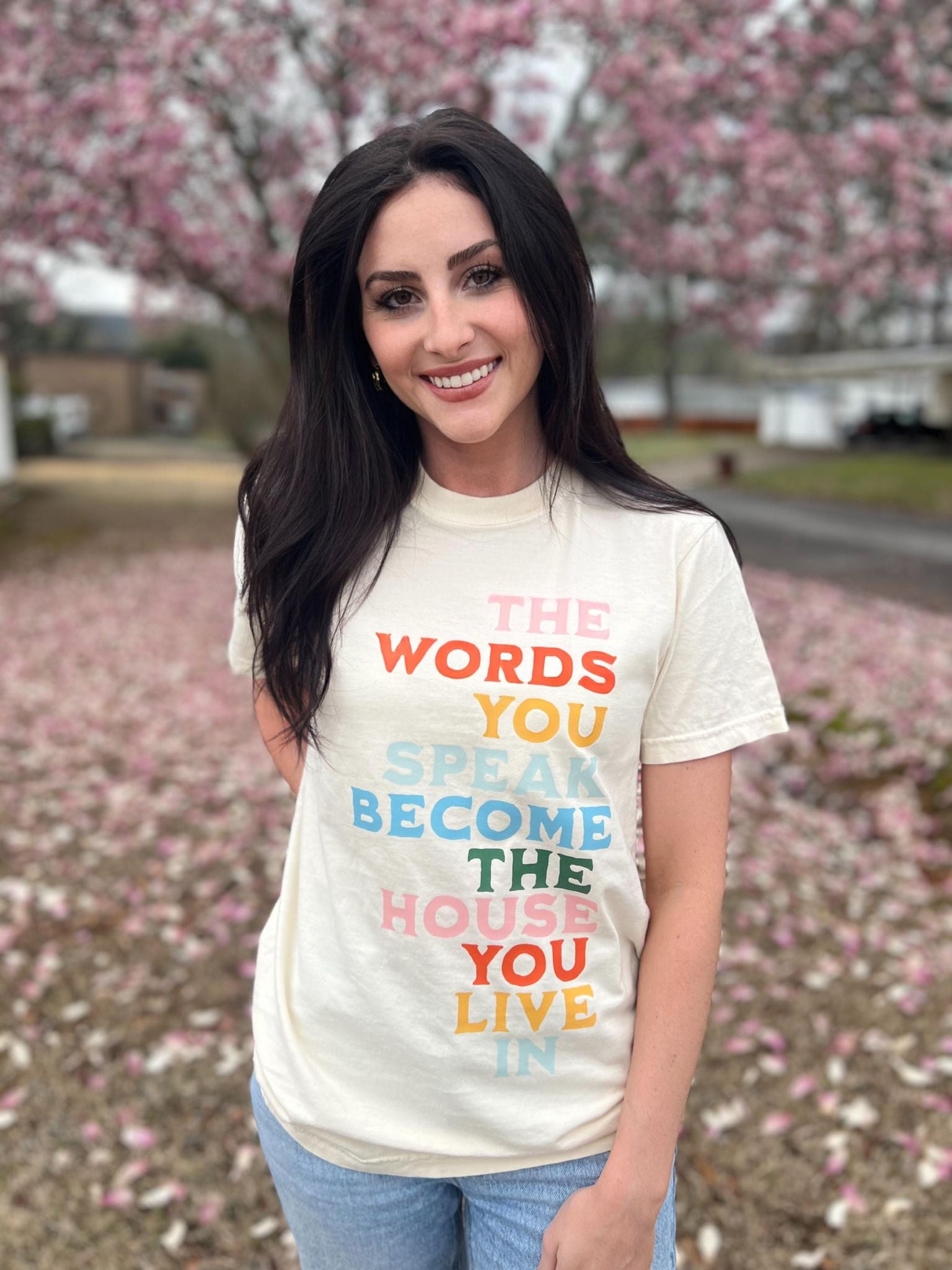 The Words You Speak Tee in ivory color, showcasing a vibrant design that promotes positivity and comfort.