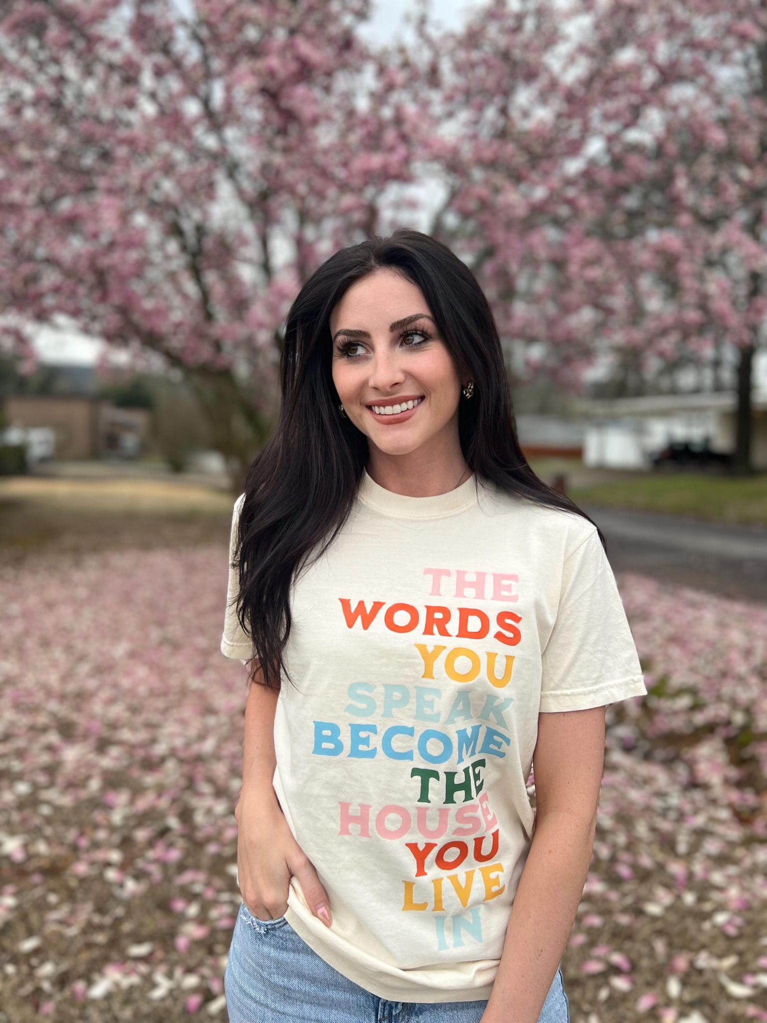 The Words You Speak Tee in ivory color, showcasing a vibrant design that promotes positivity and comfort.