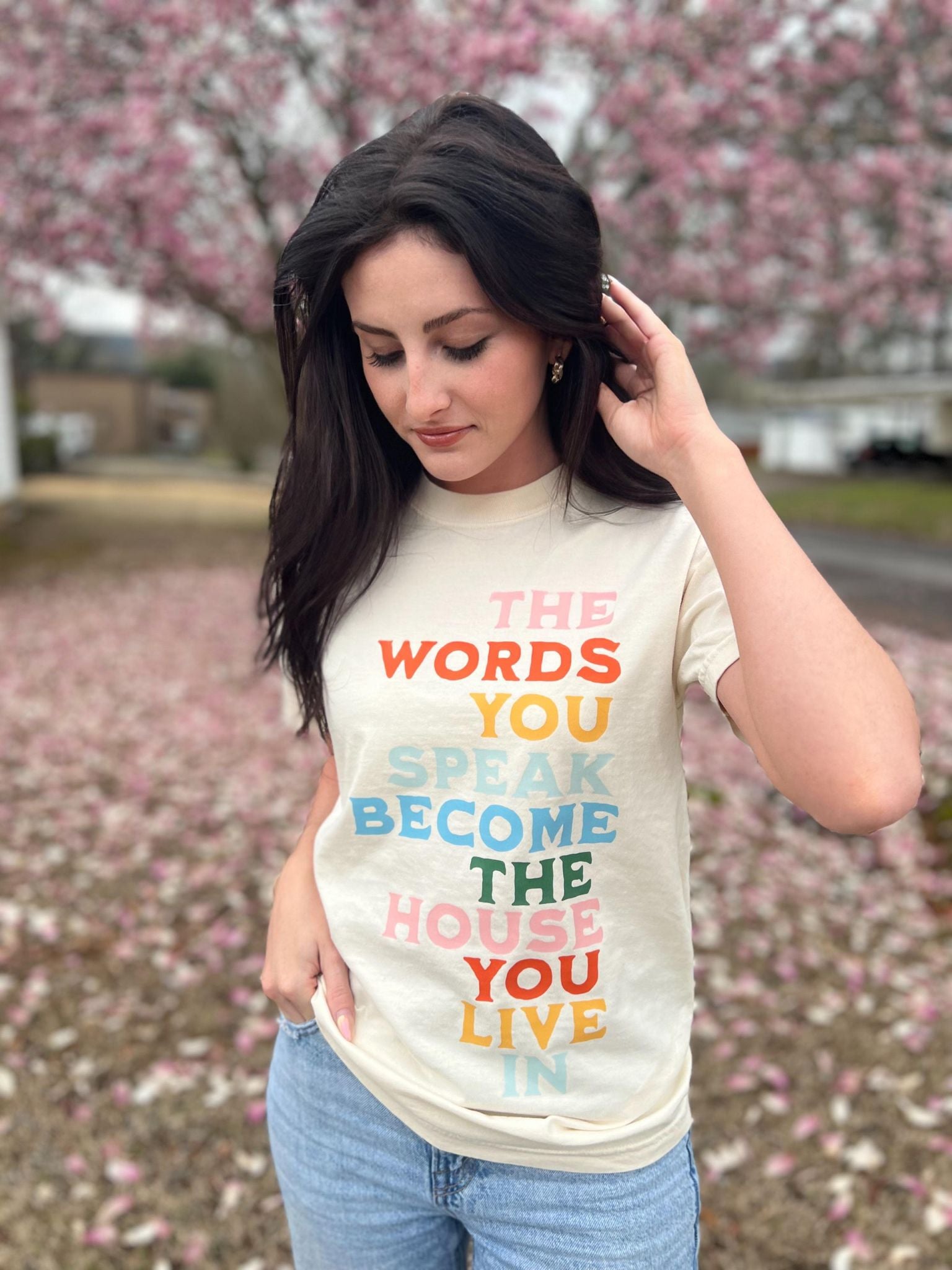 The Words You Speak Tee in ivory color, showcasing a vibrant design that promotes positivity and comfort.