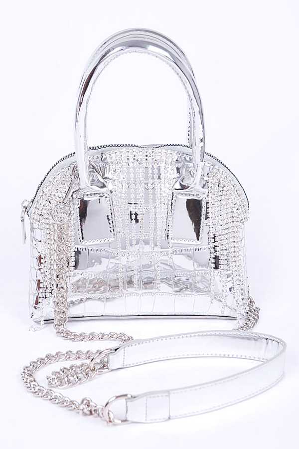 The Z ERA Bag featuring a stylish design with rhinestones and metal accents, measuring 8 inches wide, 6 inches high, and 2.5 inches deep.