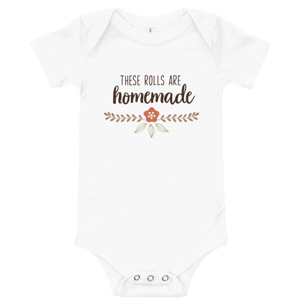 A cute baby wearing a Homemade Rolls Baby Onesie, showcasing its comfy design and vibrant colors.